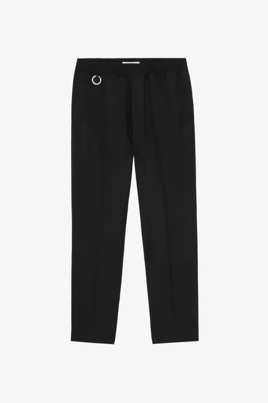 WOOL TAPERED SUIT PANT sold by Etudes Studio
