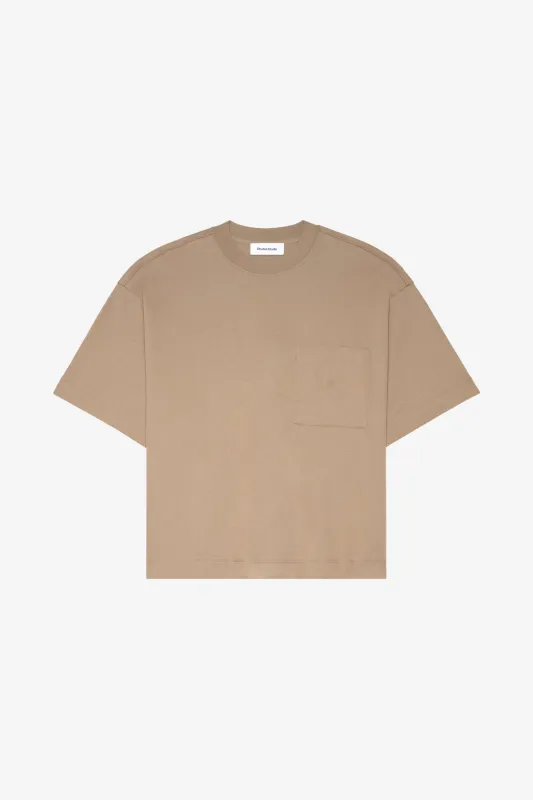 OVERSIZED POCKET T-SHIRT É sold by Etudes Studio