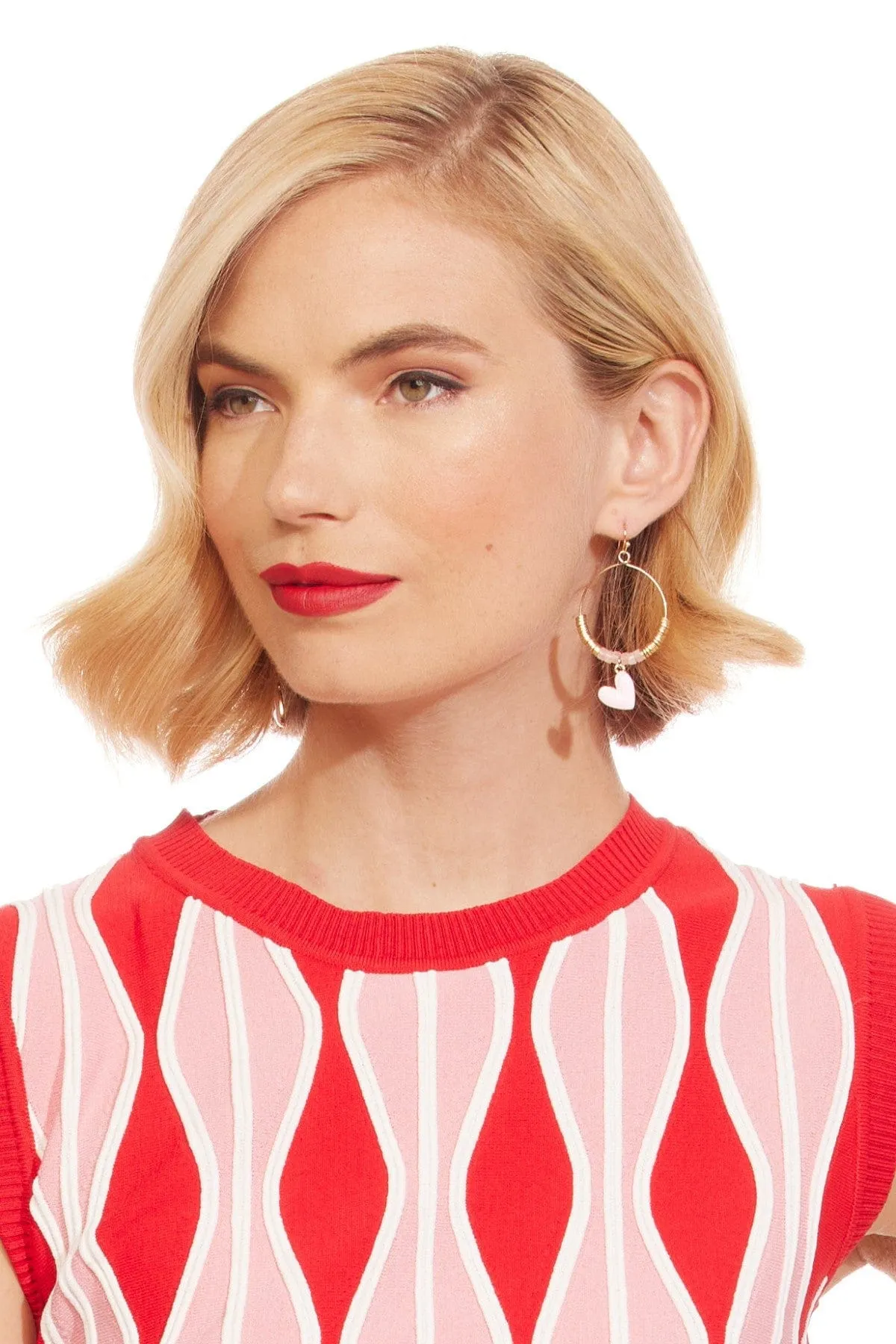 Hearts on a Hoop Earrings sold by Eva Franco