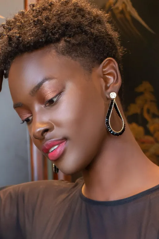 Black & Gold Beaded Teardrops sold by Eva Franco