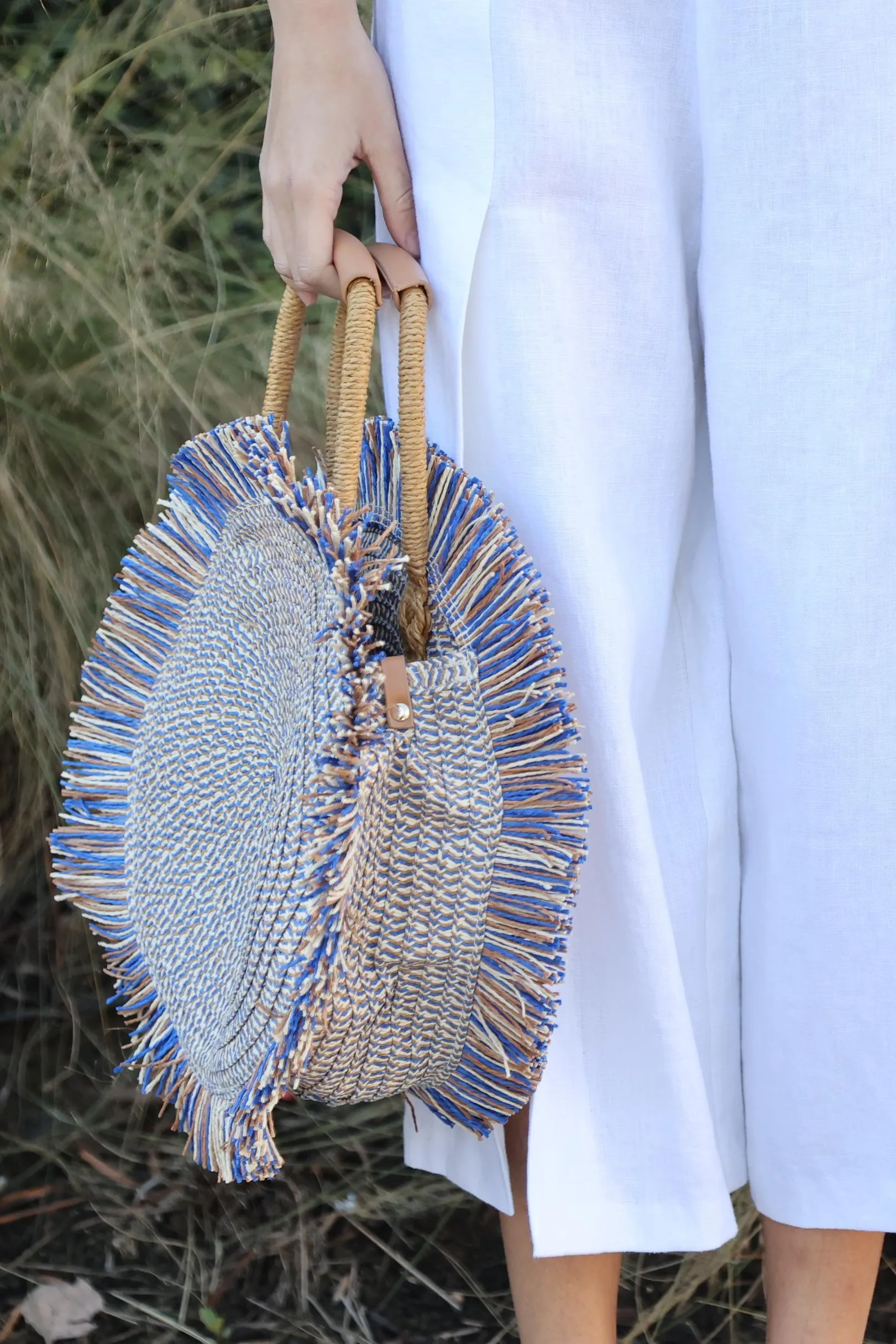 Blue Fringe Round Bag sold by Eva Franco