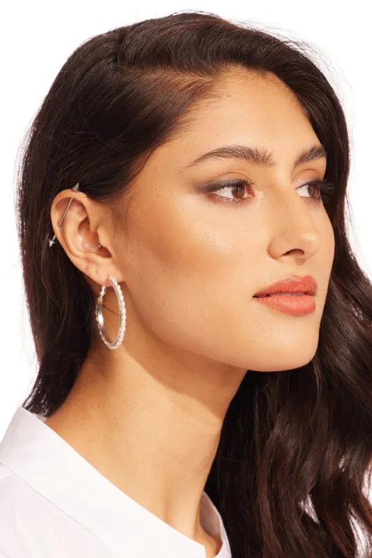 Pearl Hoop Earring sold by Eva Franco