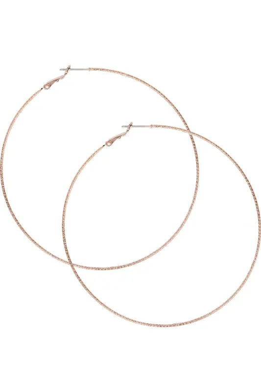 Rose Gold Hoops sold by Eva Franco