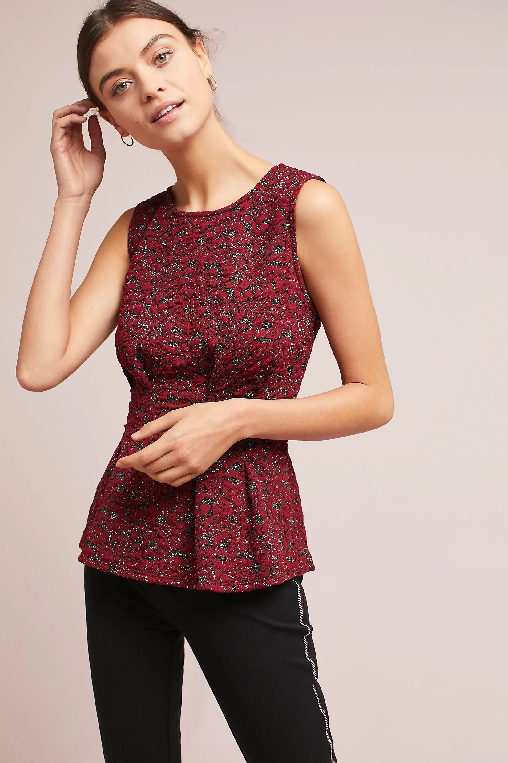 Metallic Peplum Top sold by Eva Franco