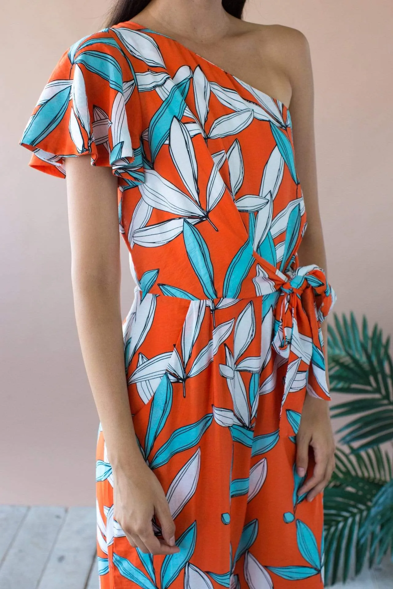 Amir One Shoulder Jumpsuit With Flutter Sleeve and Pockets- Rio Flora sold by Eva Franco product image thumbnail 3