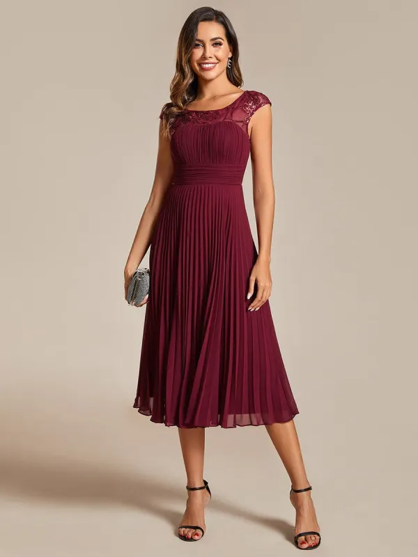 A-Line Pleated Chiffon Wedding Guest Dress with Round Neckline and Cap Sleeves sold by Ever Pretty