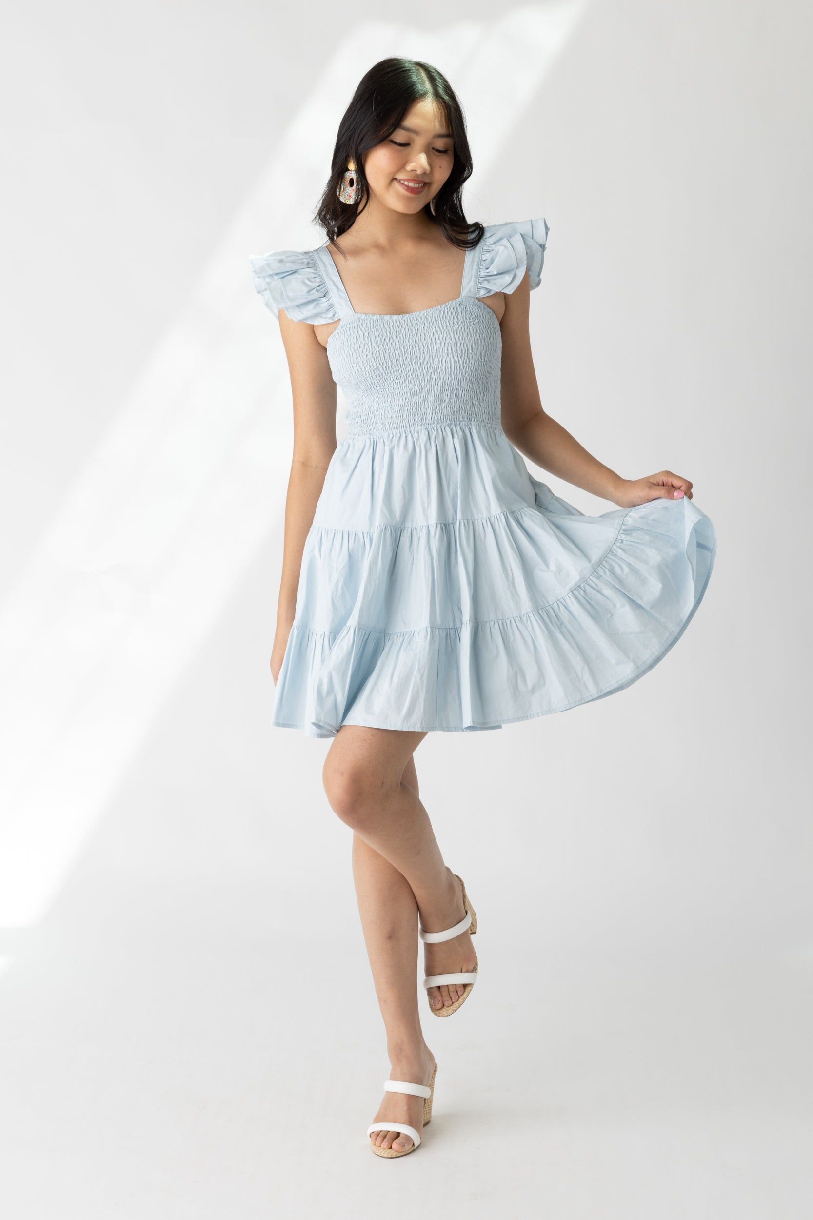 Alison Flutter Sleeve Smocked Mini Dress sold by fab'rik