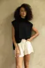 Clay Sleeveless Turtleneck Sweater sold by fab'rik