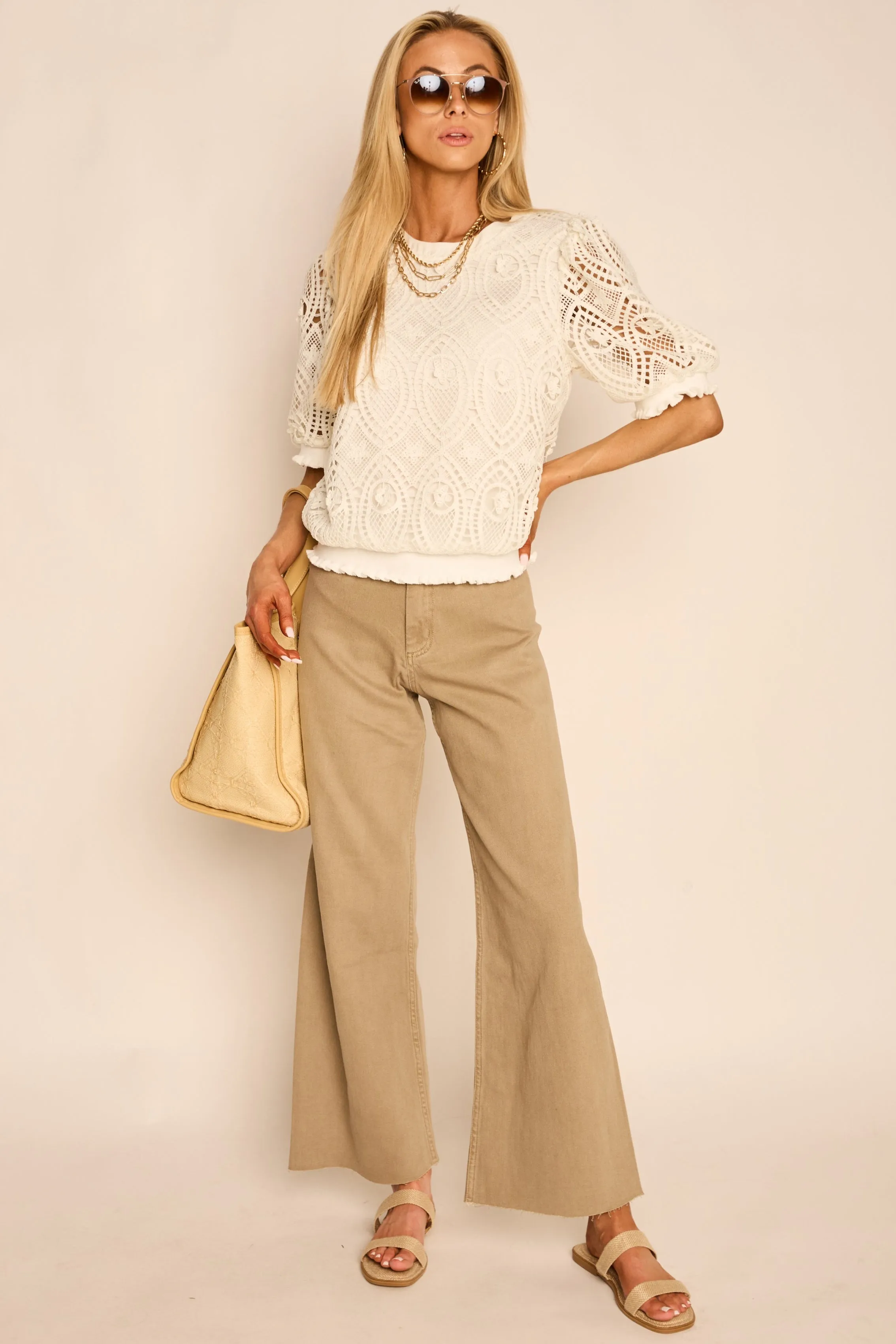 Dione High Rise Wide Leg Raw Hem Crop Pants sold by fab'rik