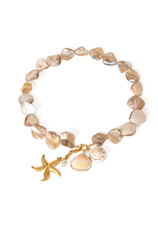 Faith Shell Y Neck sold by fab'rik