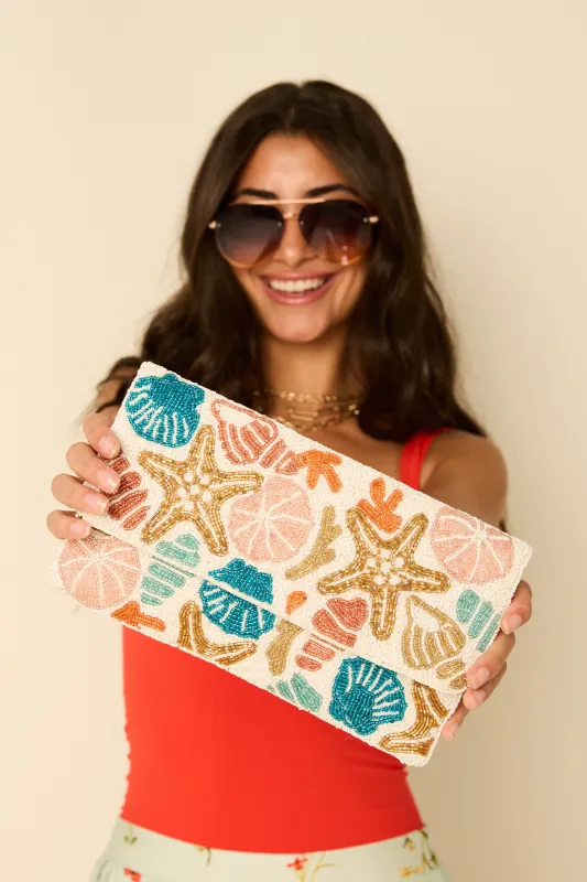 Seashells Beaded Clutch sold by fab'rik