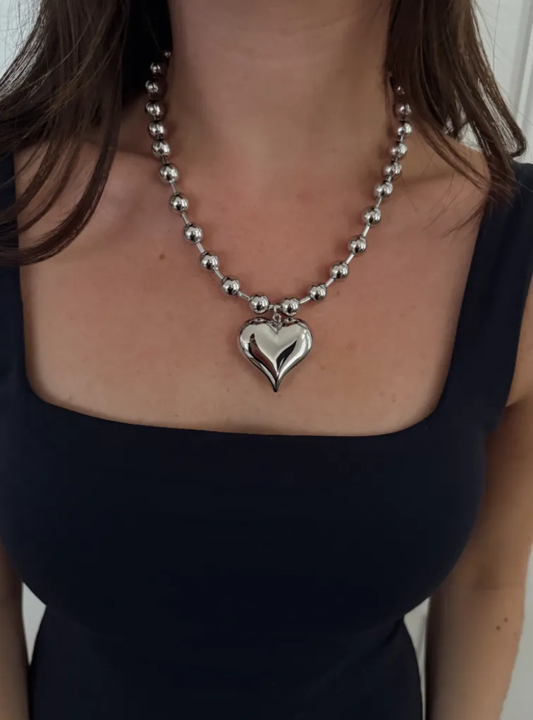 Silver Bubble Heart Necklace sold by fab'rik