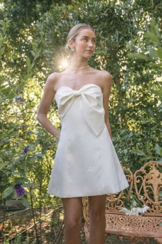 Ava Bow Detail Mini Dress made by Bright
