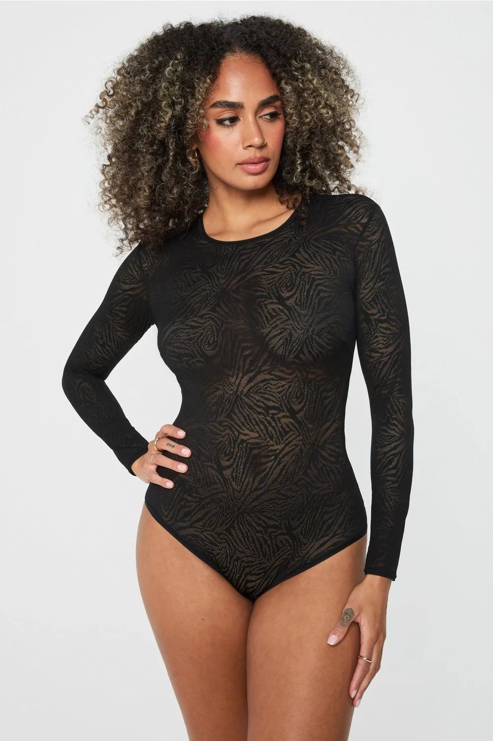 Hot Mesh Long Sleeve Bodysuit sold by Fabletics