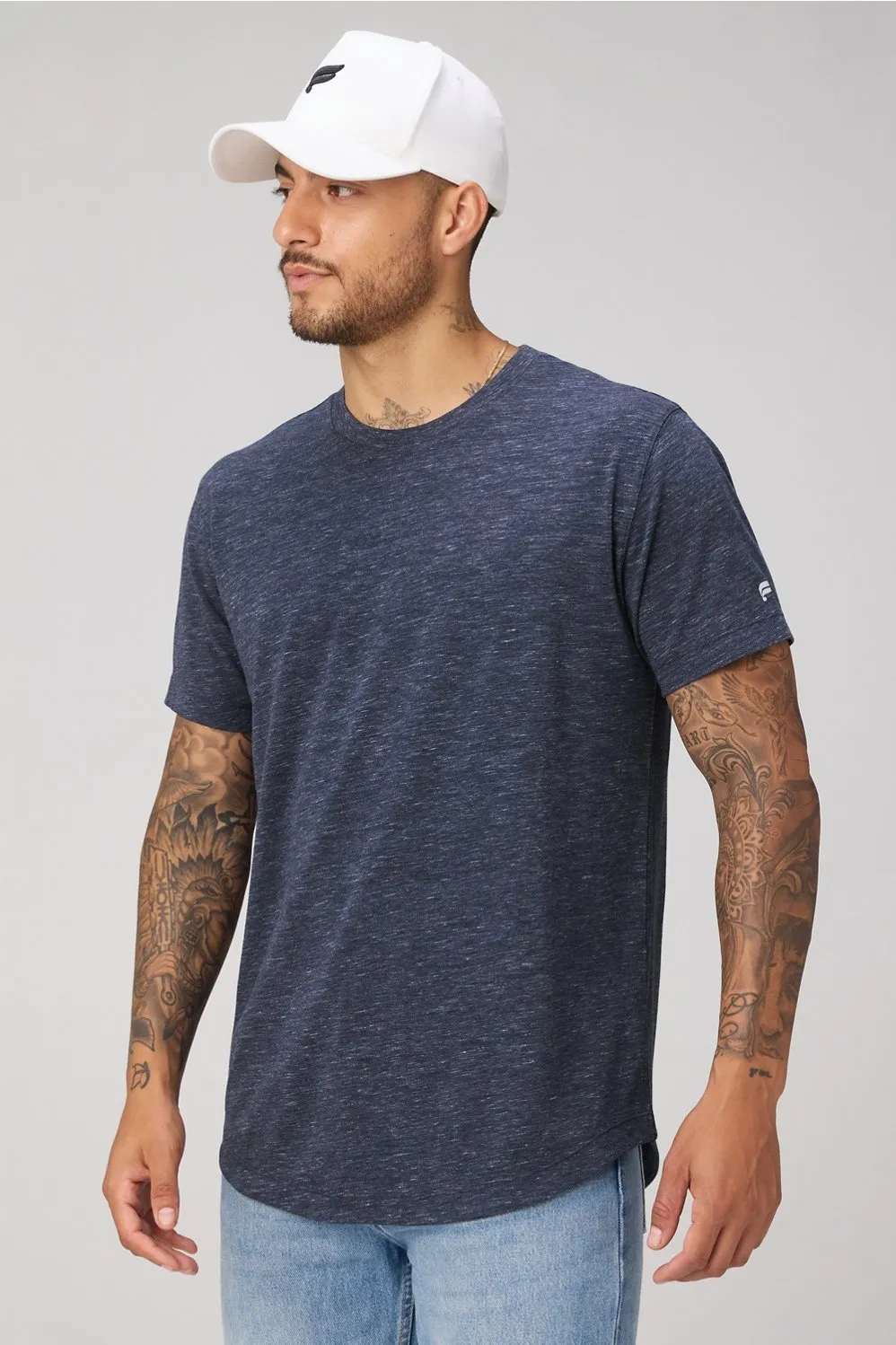 The 24-7 Tee (Curved Hem) sold by Fabletics