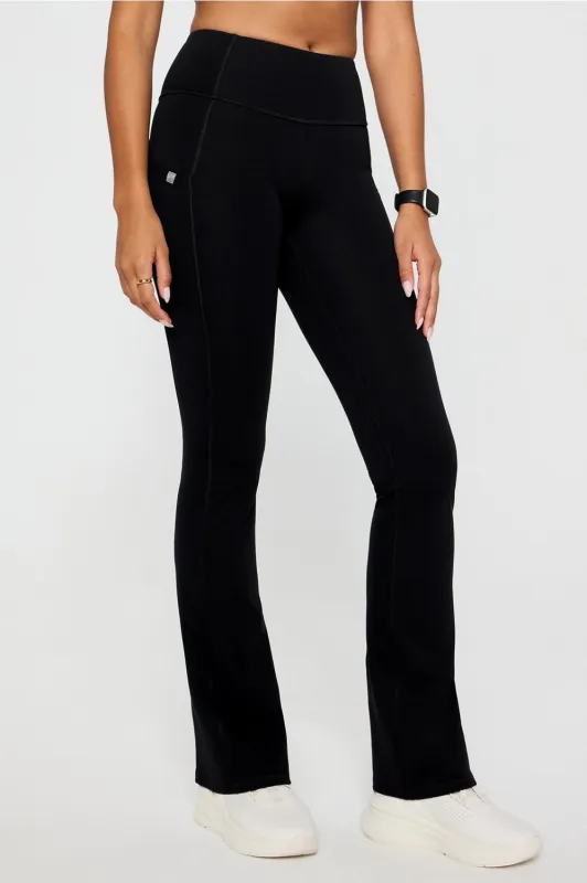 StretchTech™ Kick Flare Scrub Legging sold by Fabletics