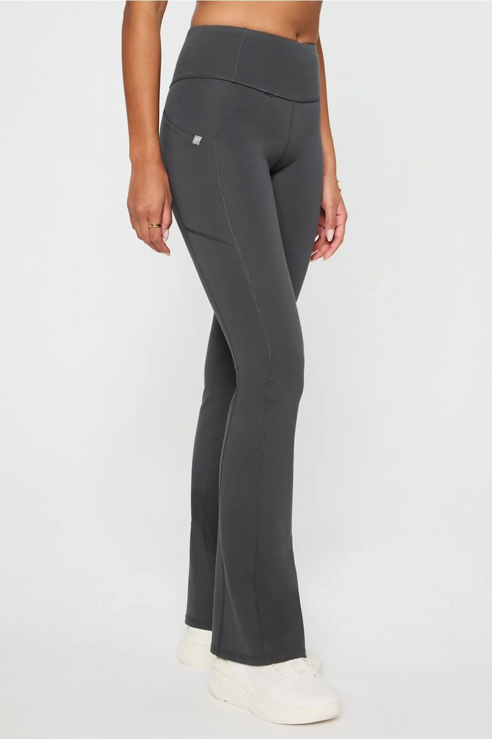 StretchTech™ Kick Flare Scrub Legging sold by Fabletics