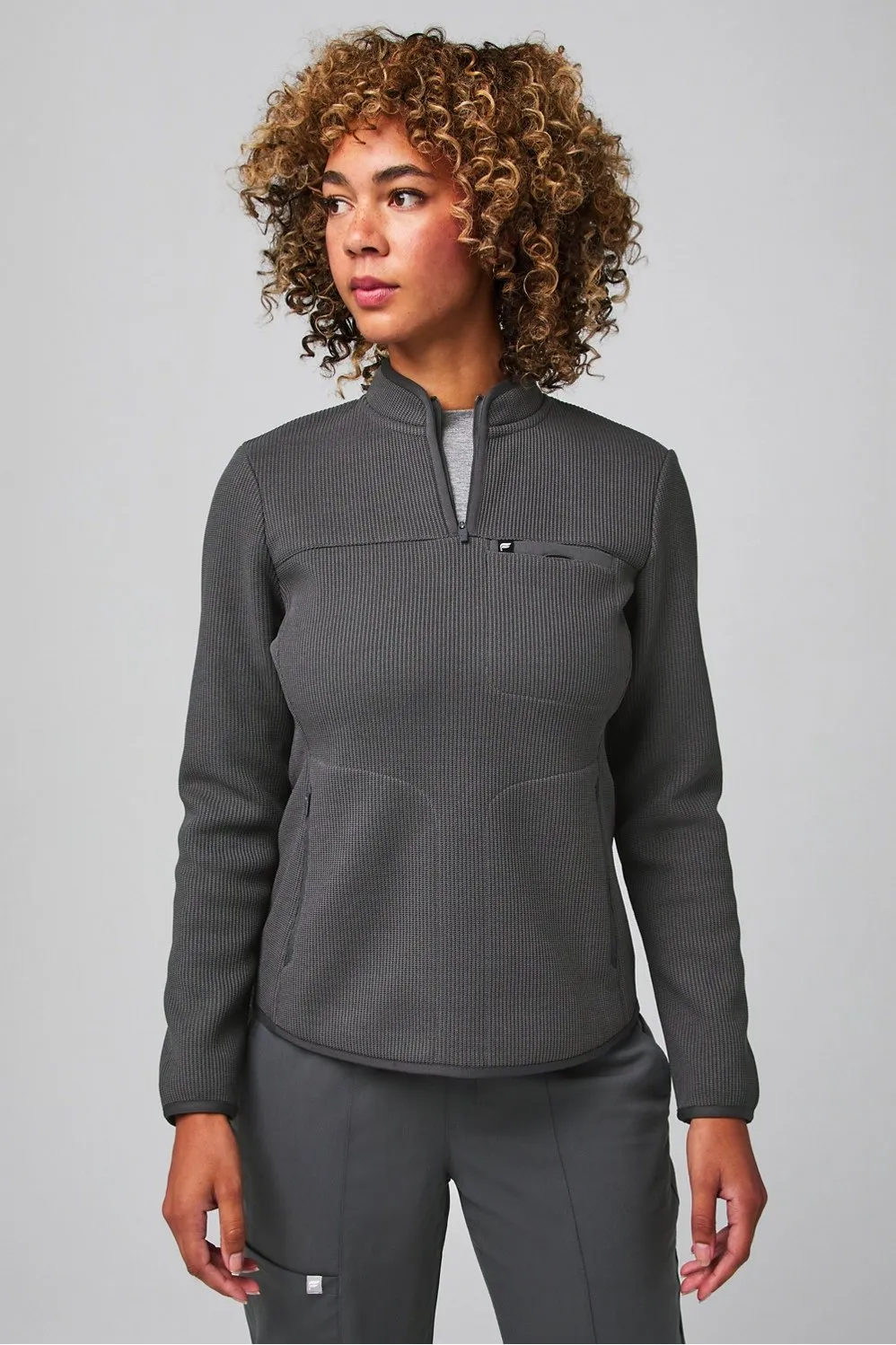 Pace Quarter Zip Scrub Jacket sold by Fabletics