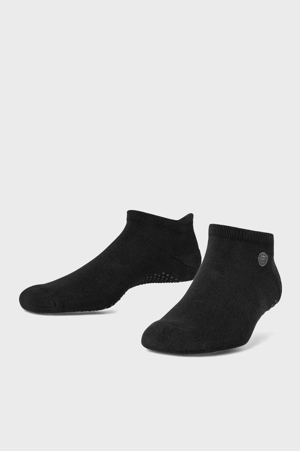 The Powerhouse Grip Sock sold by Fabletics