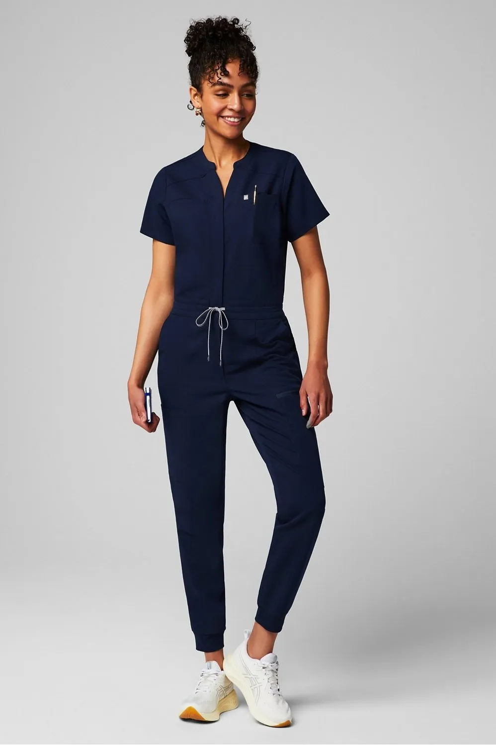 Empower Scrub Jumpsuit sold by Fabletics