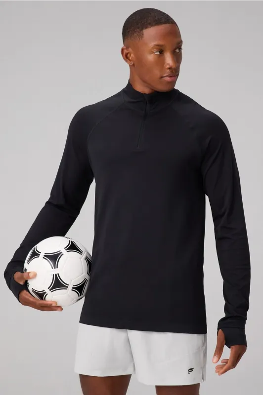 The Training Day Quarter Zip sold by Fabletics