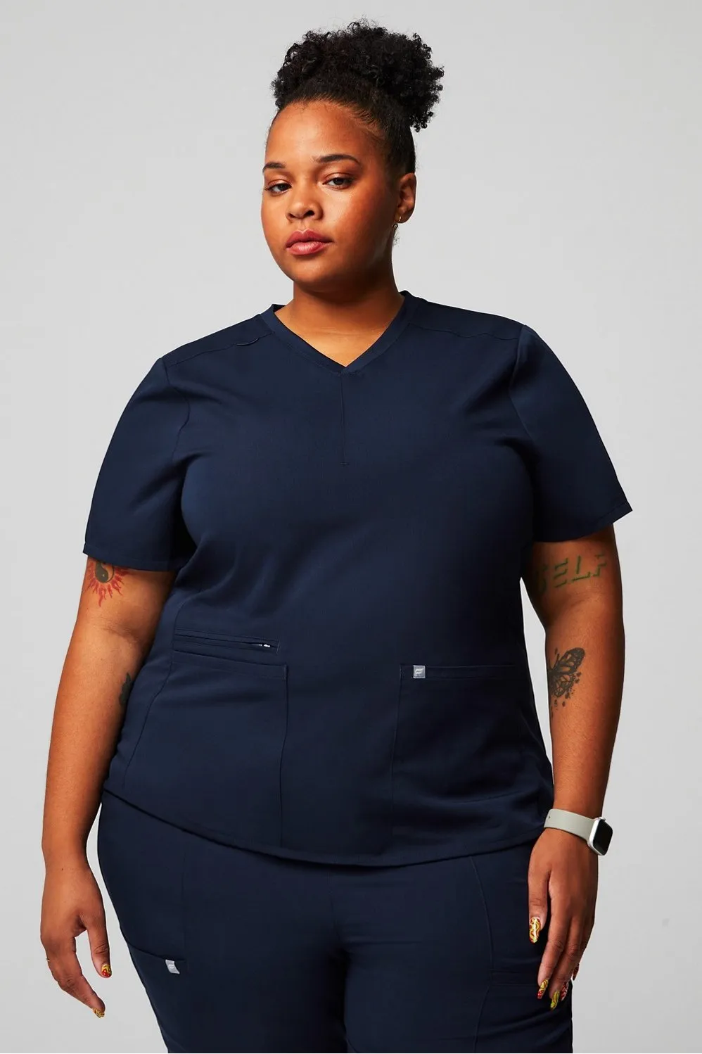 Mode Scrub Top sold by Fabletics