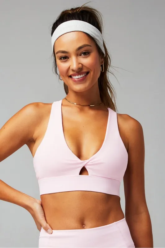 Oasis Twist Medium Impact Sports Bra sold by Fabletics