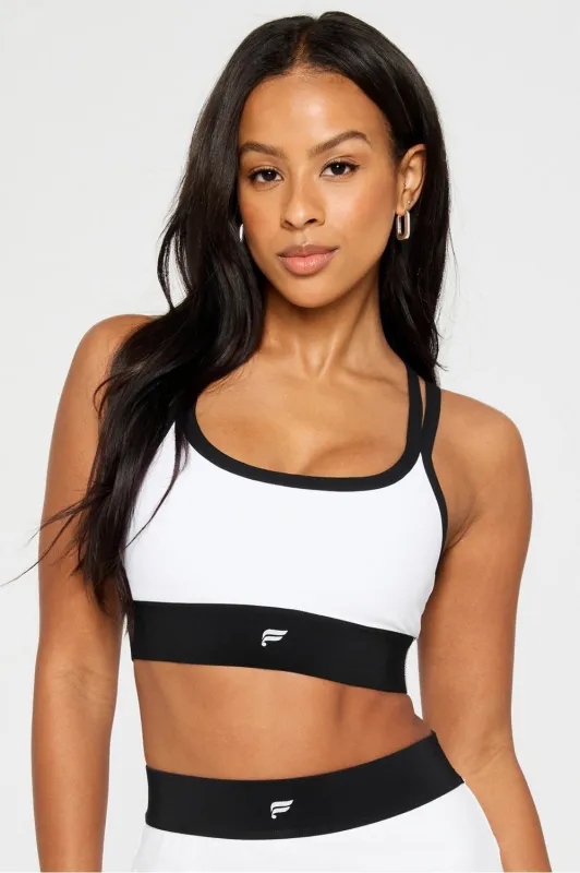 Principal Longline Medium Impact Sports Bra sold by Fabletics