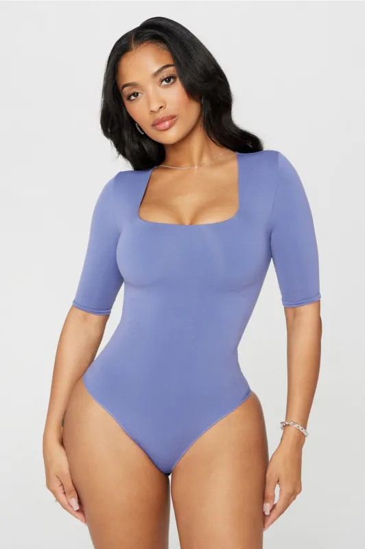 Nearly Naked Shapewear 3/4 Sleeve Bodysuit sold by Fabletics
