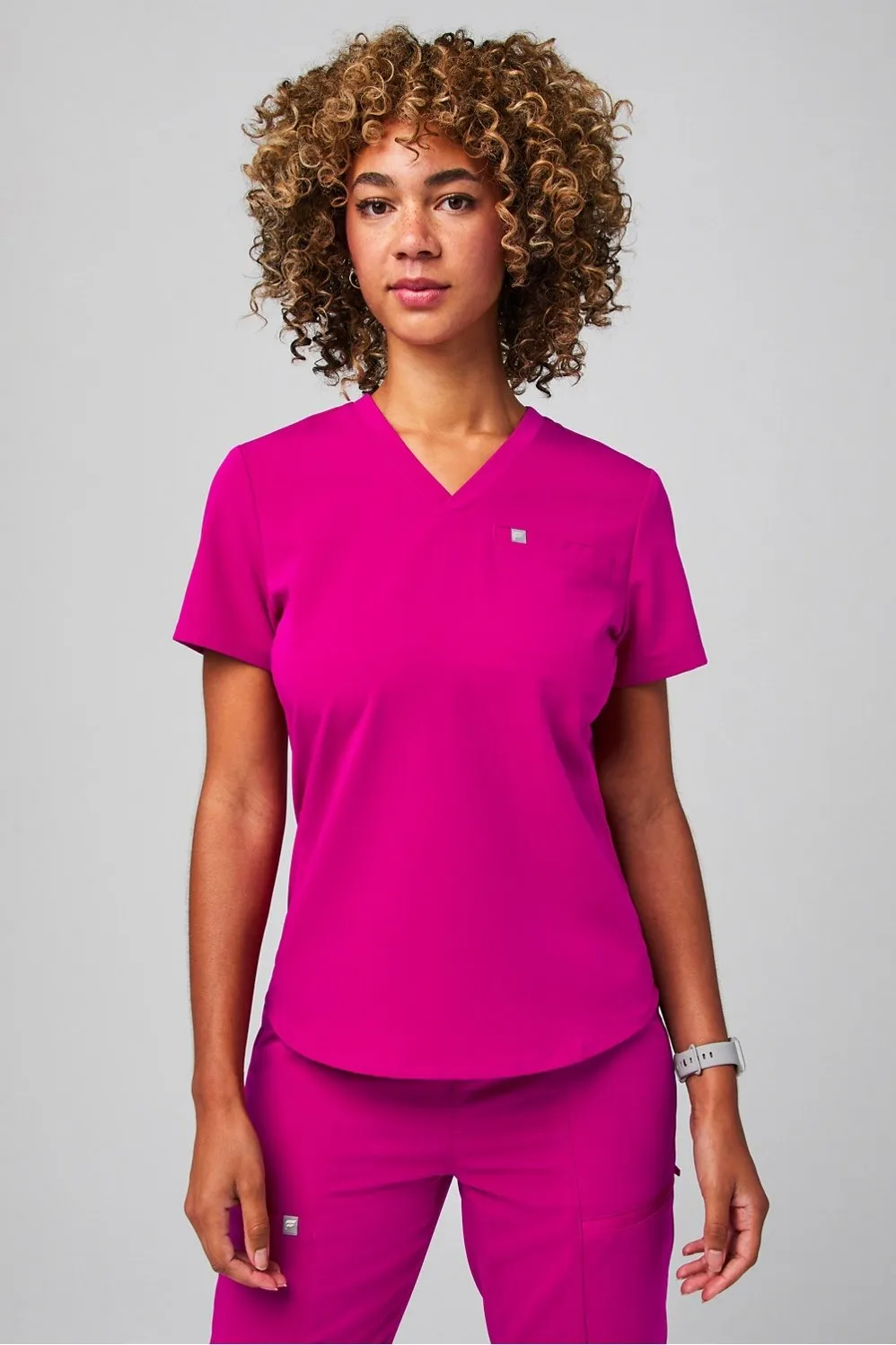 Vital Flex 1-Pocket Scrub Top sold by Fabletics