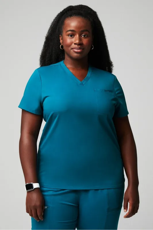 Vital 1-Pocket Scrub Top sold by Fabletics