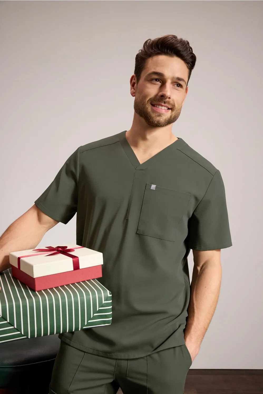 Helix 1-Pocket Scrub Top sold by Fabletics