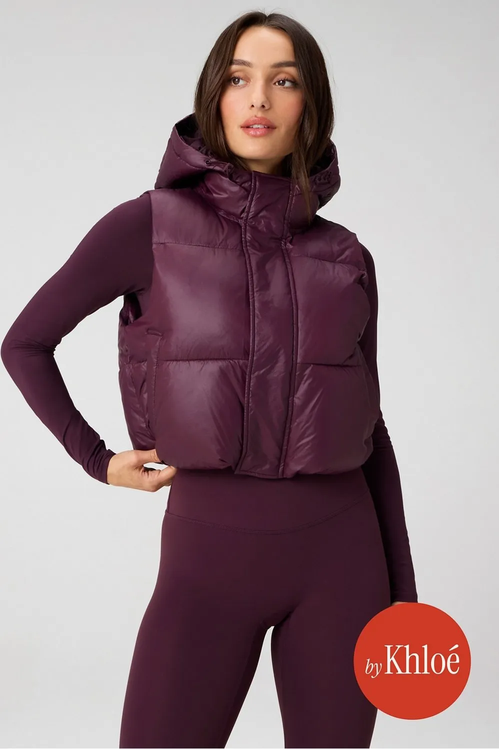 Essential Shine Cropped Hooded Puffer Vest sold by Fabletics