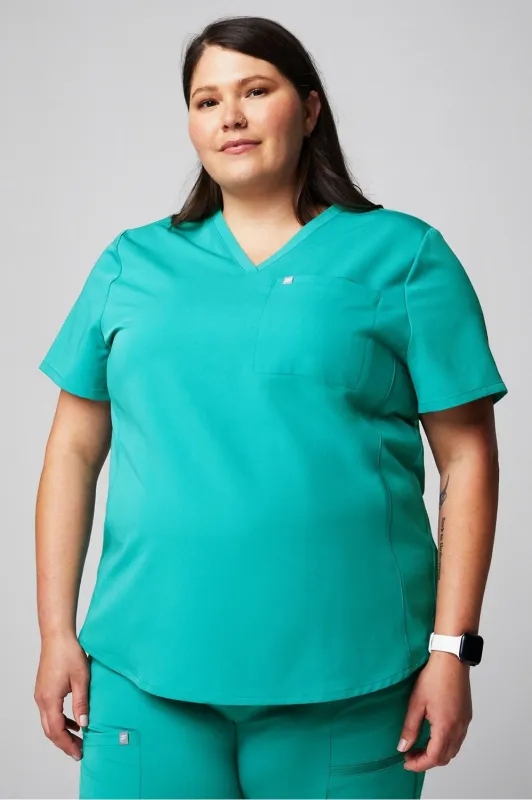 Vital 1-Pocket Scrub Top sold by Fabletics