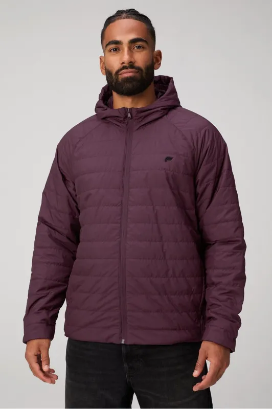 The Commuter Light Fill Jacket sold by Fabletics