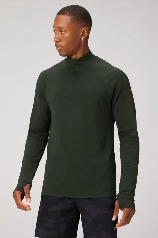 The Training Day Quarter Zip sold by Fabletics