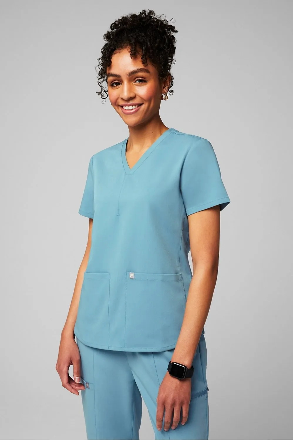 Method 2-Pocket Scrub Top sold by Fabletics