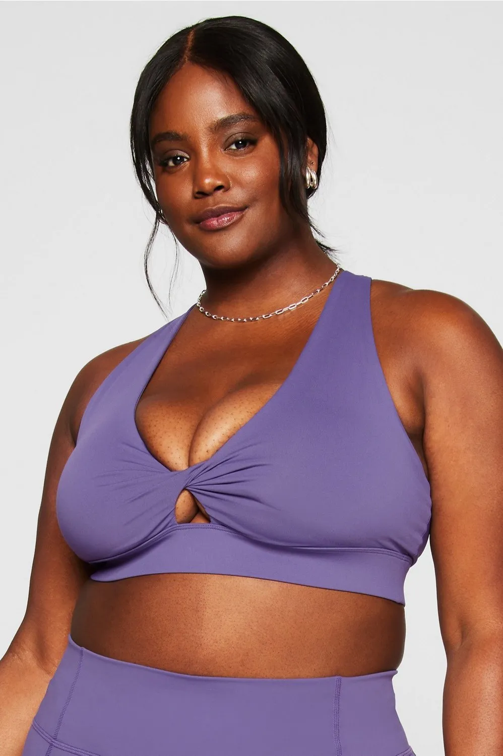 Oasis Twist Medium Impact Sports Bra sold by Fabletics