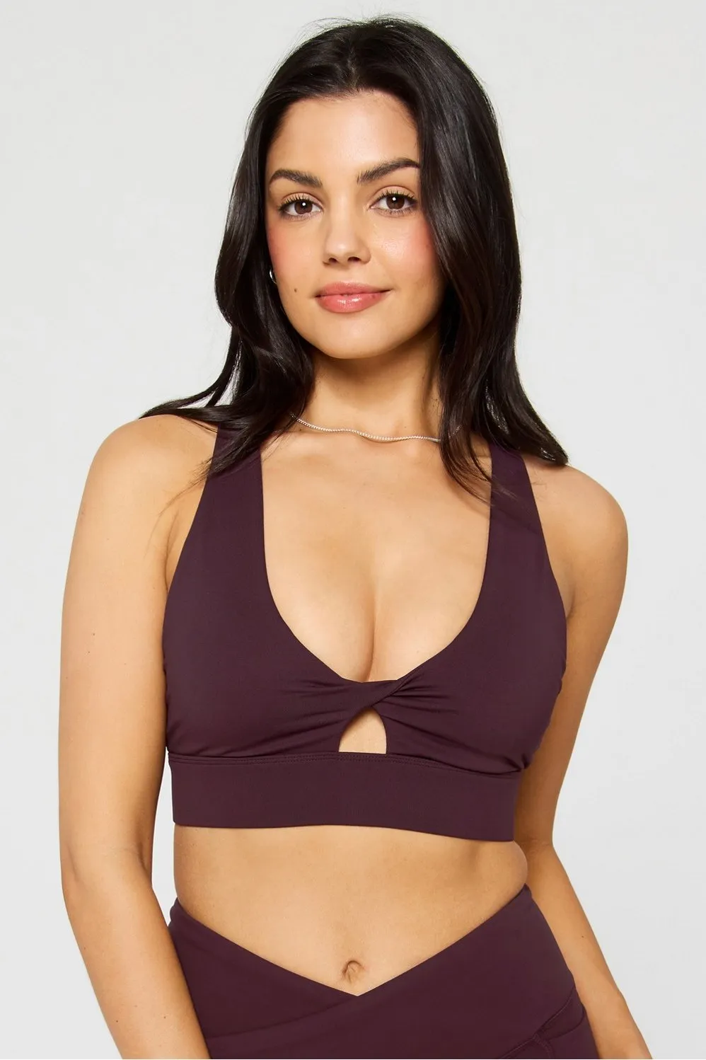 Oasis Twist Medium Impact Sports Bra sold by Fabletics