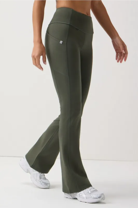 StretchTech™ Kick Flare Scrub Legging sold by Fabletics