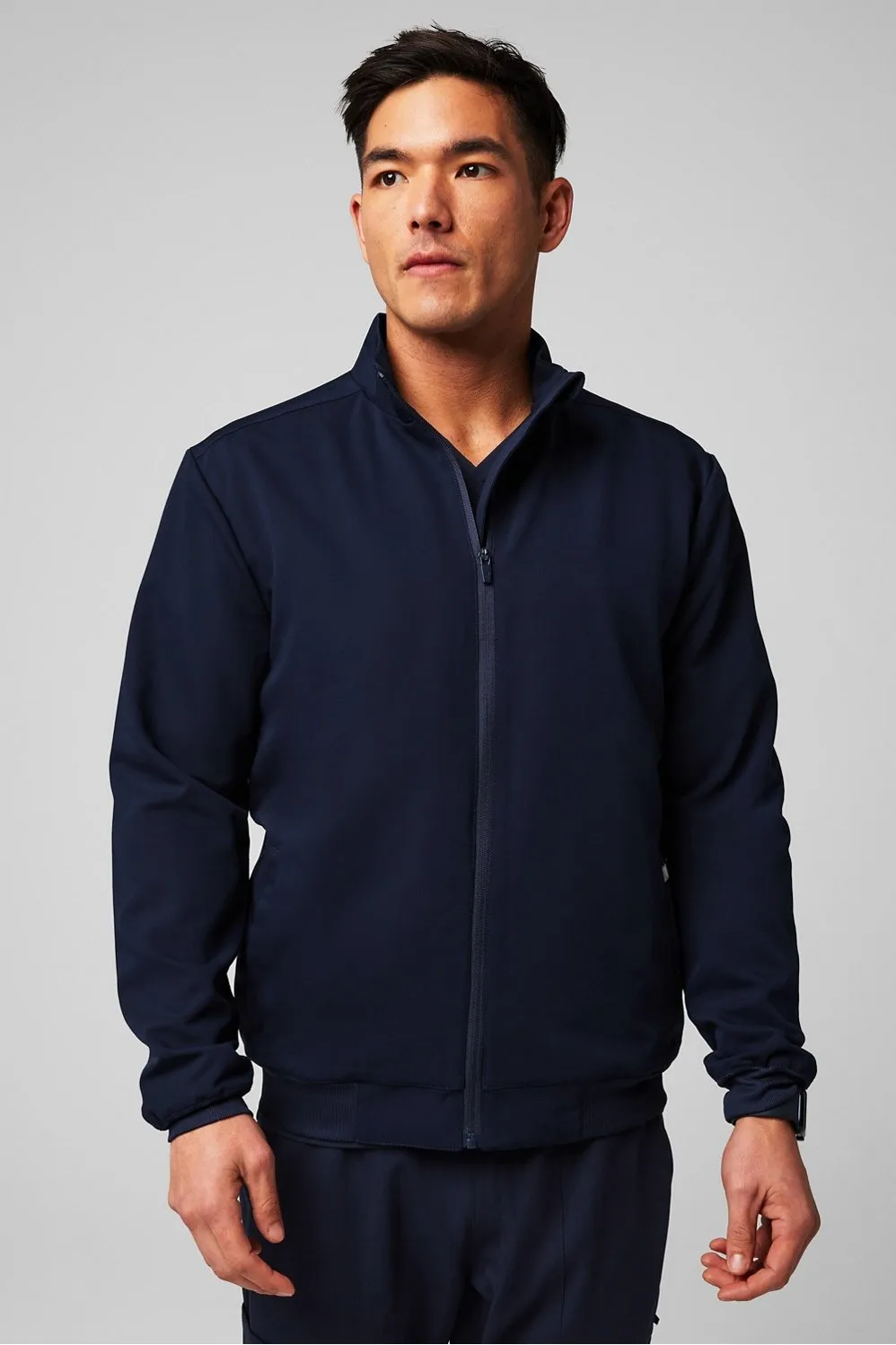 Foundation Scrub Jacket sold by Fabletics