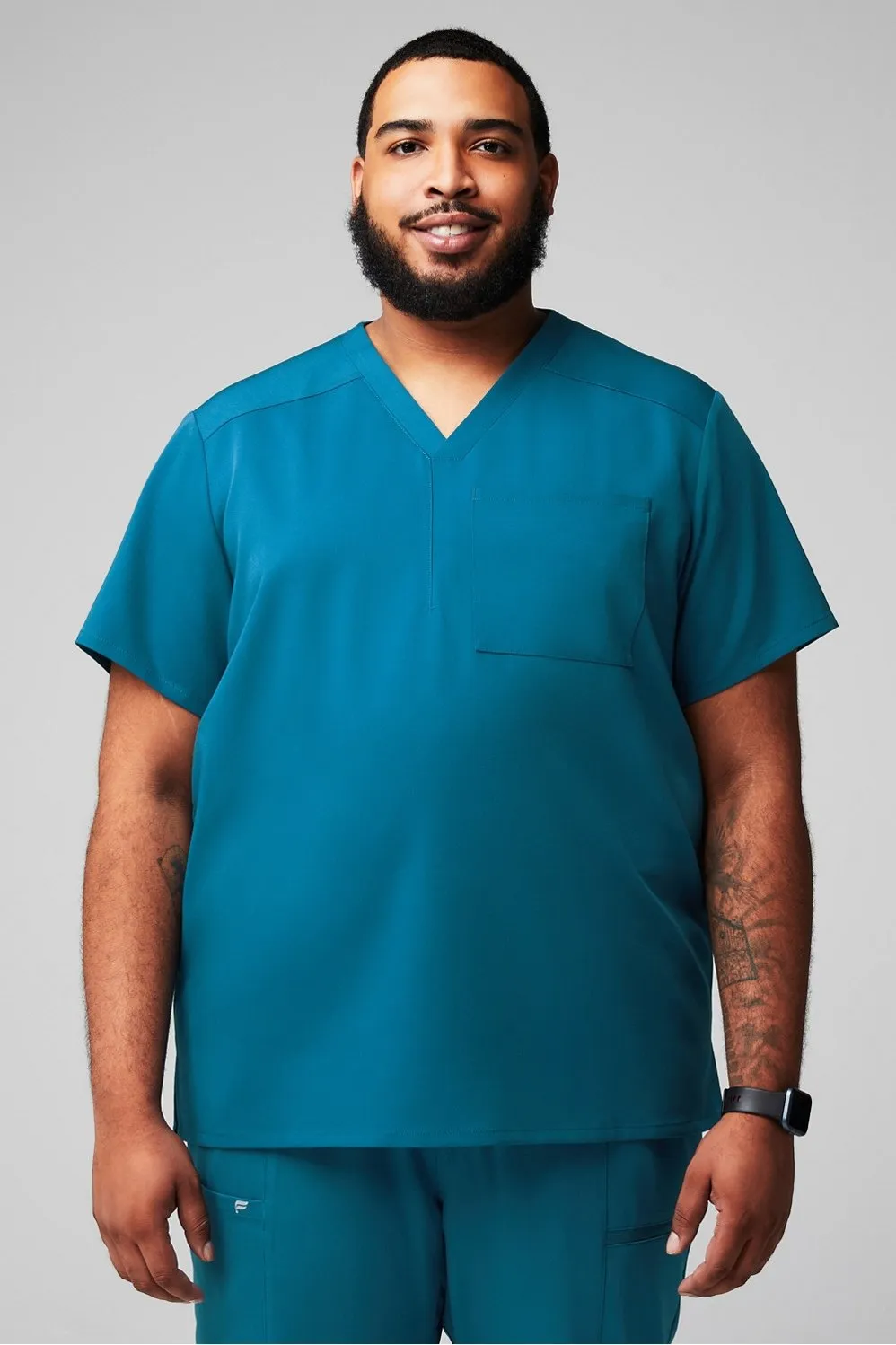 Helix 1-Pocket Scrub Top sold by Fabletics