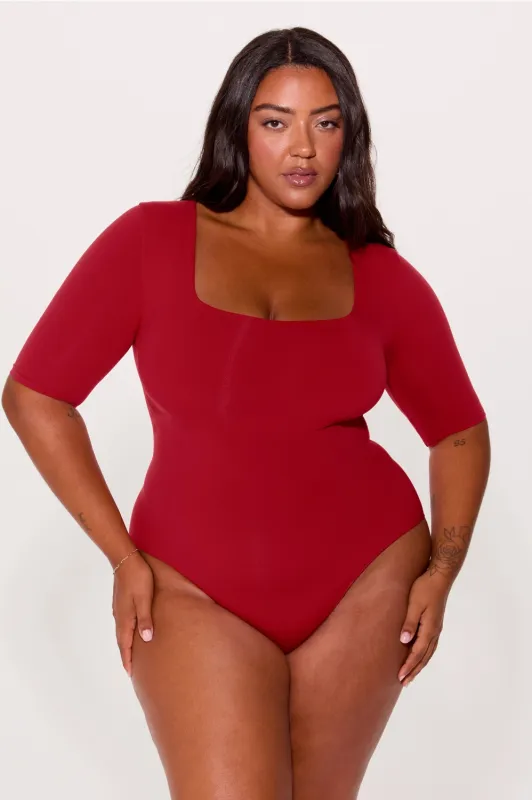 Nearly Naked Shapewear 3/4 Sleeve Bodysuit sold by Fabletics