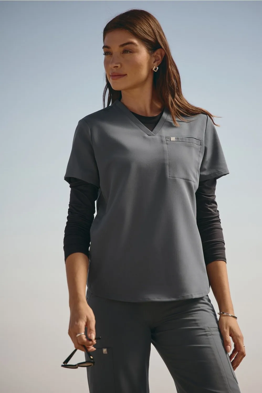 Vital 1-Pocket Scrub Top sold by Fabletics