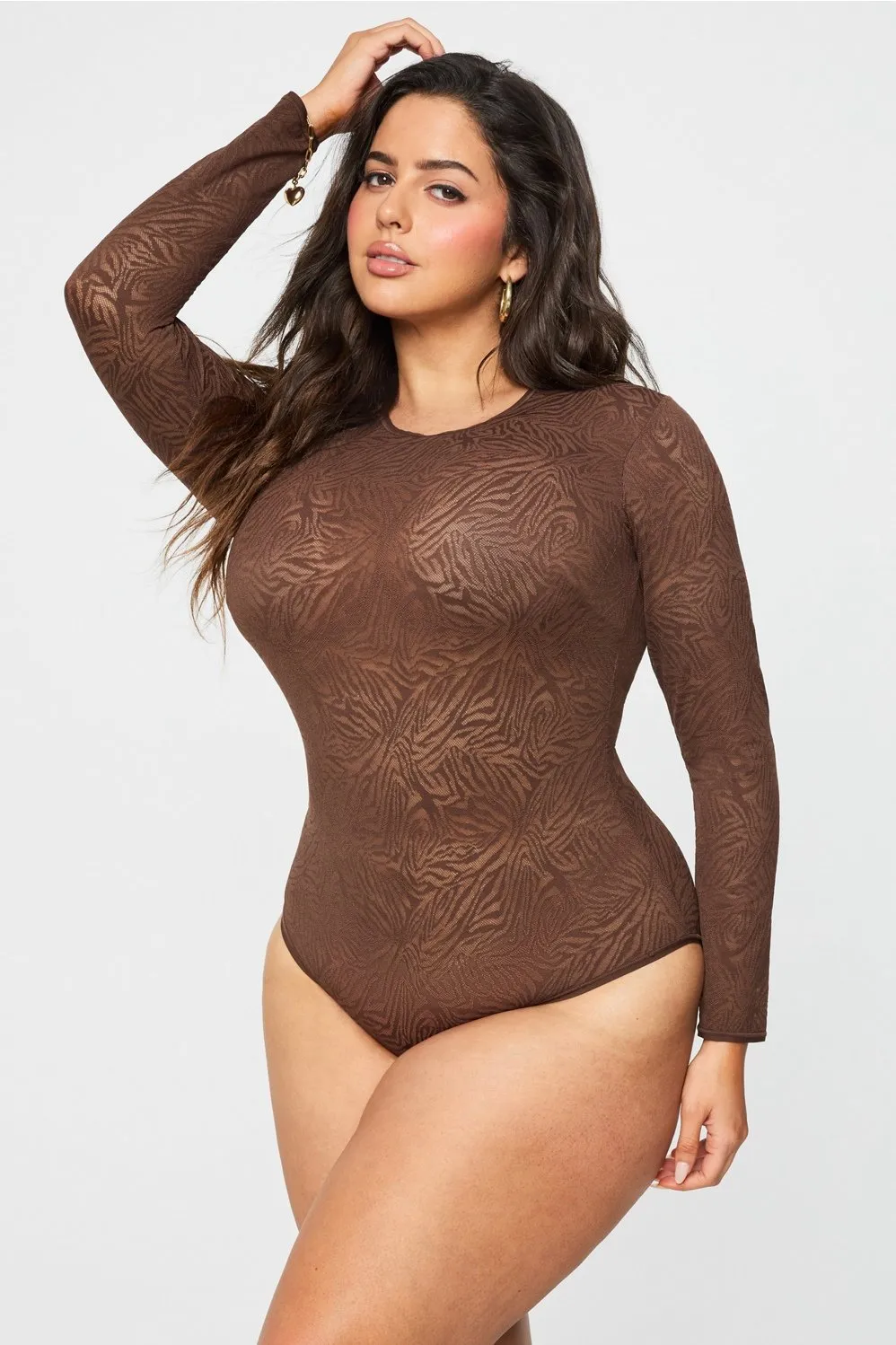 Hot Mesh Long Sleeve Bodysuit sold by Fabletics