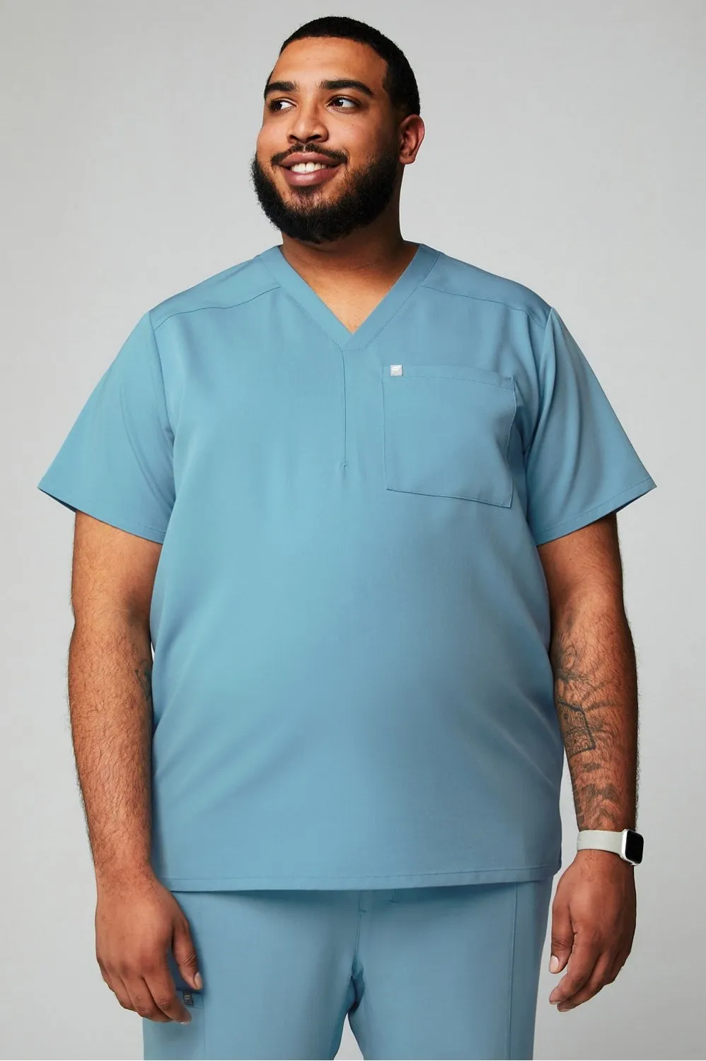 Helix 1-Pocket Scrub Top sold by Fabletics