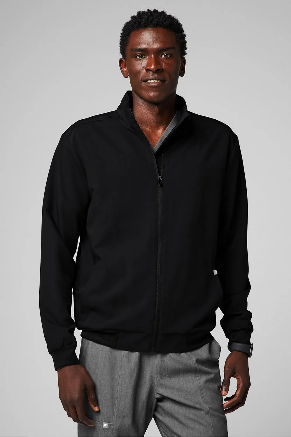 Foundation Scrub Jacket sold by Fabletics