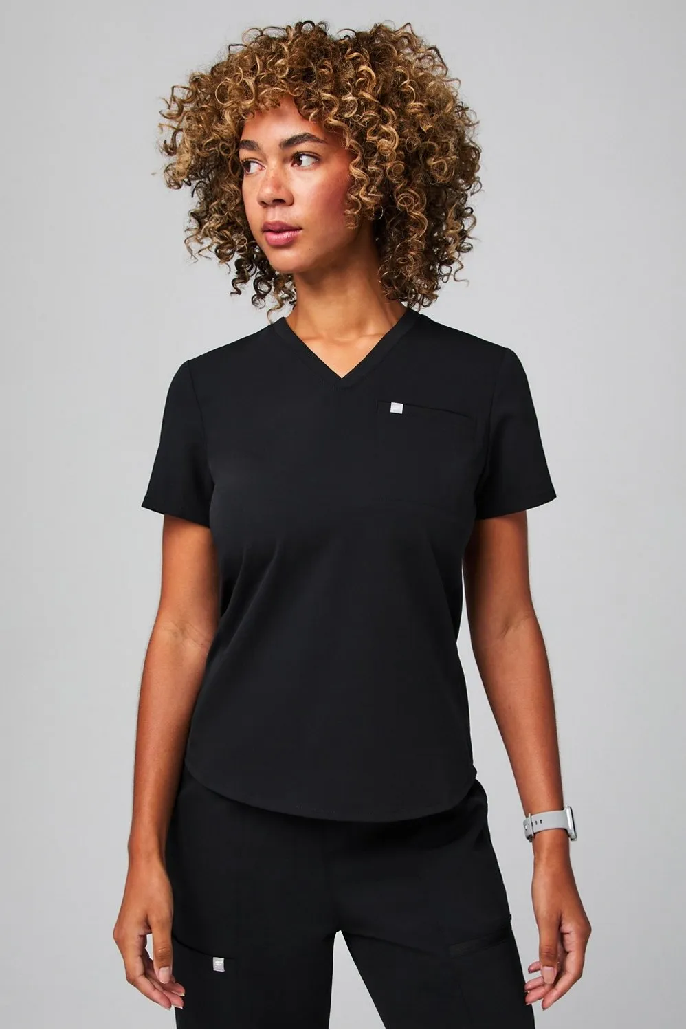 Vital Flex 1-Pocket Scrub Top sold by Fabletics