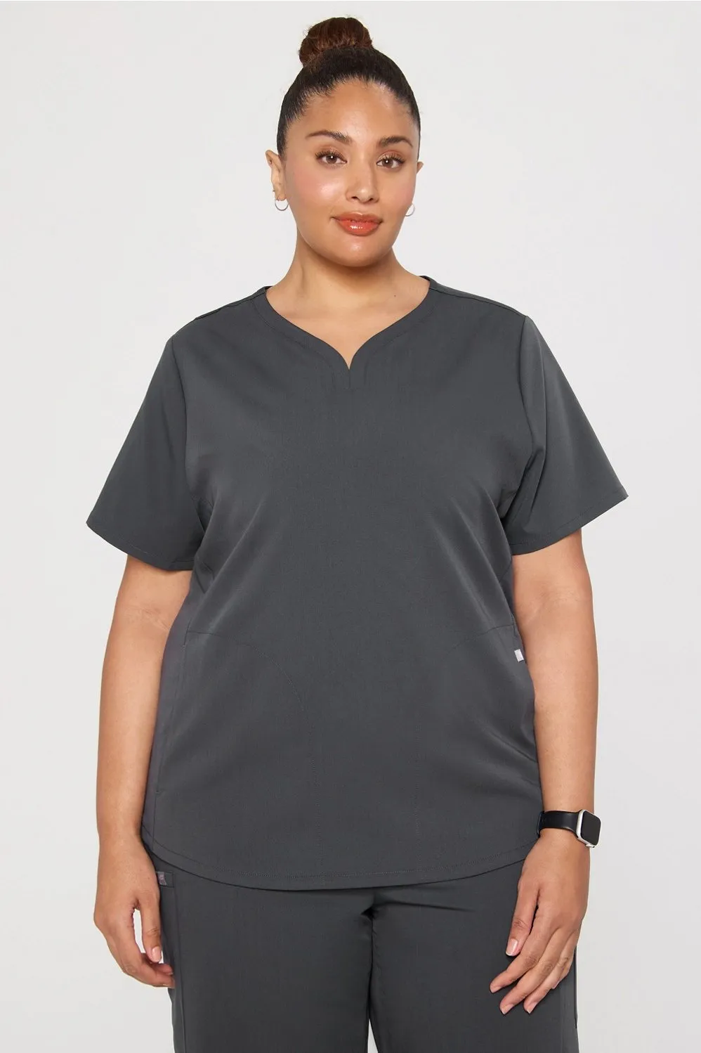 Petal 3-Pocket Scrub Top sold by Fabletics