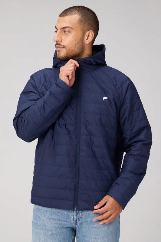 The Commuter Light Fill Jacket sold by Fabletics